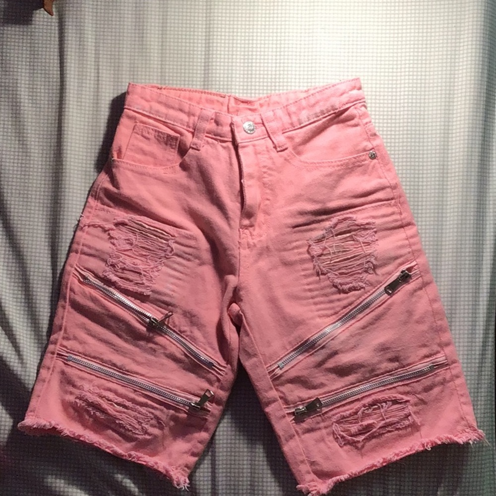 Pink ripped jean shorts